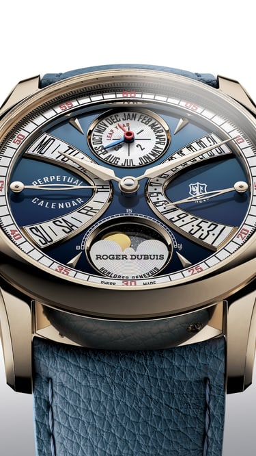 The image presents a close-up, front-facing view of the Hommage la Placide timepiece, featuring a polished gold-toned case and a striking blue dial. The dial is highly intricate, displaying multiple sub-dials and indicators, including a prominent "PERPETUAL CALENDAR" inscription, a moon phase complication, and various date and day displays. The watch is fitted with a matching blue leather strap. The background is a clean, minimalist white, ensuring the exquisite details and craftsmanship of the timepiece are the sole focus.