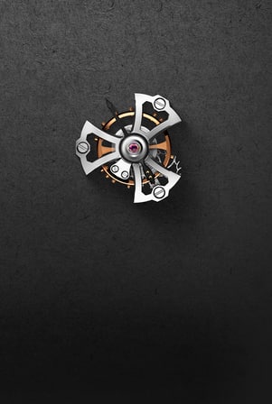 this image shows a close up a the simple tourbillon piece complication.